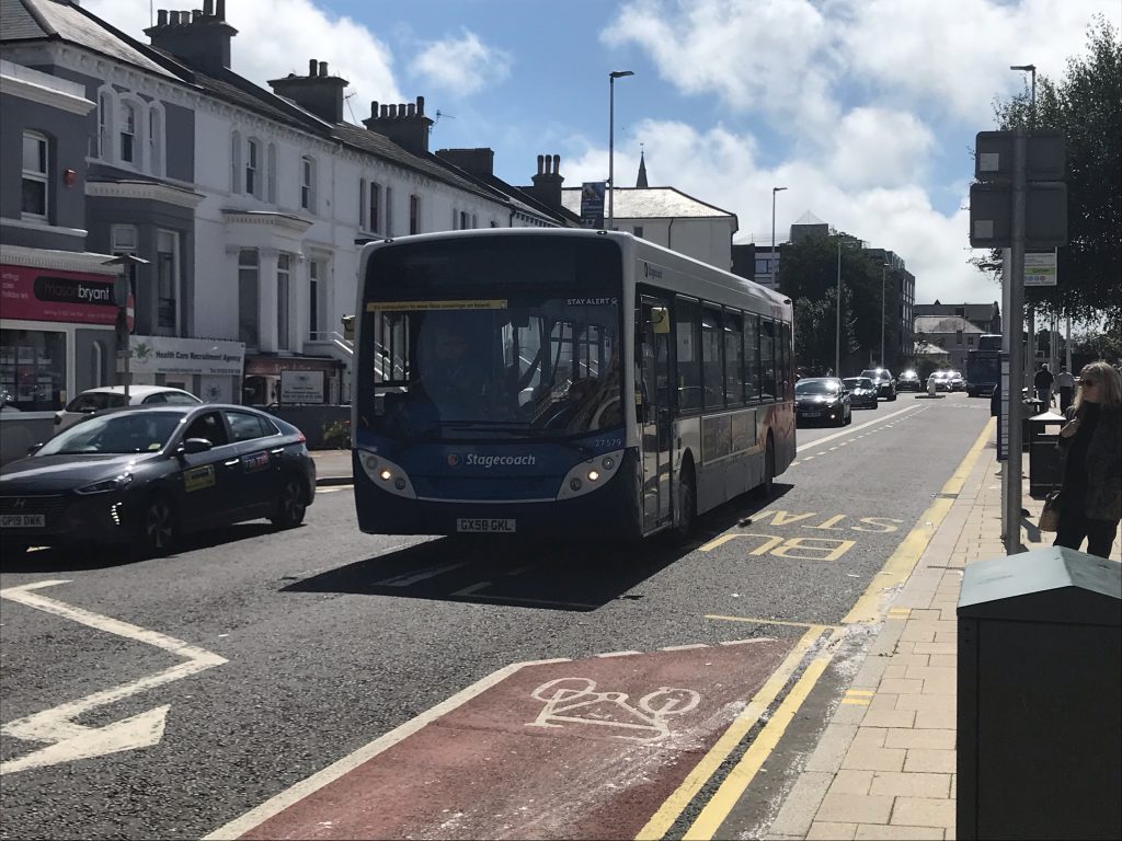 A Stagecoach bus drives through the Eastbourne Town Centre